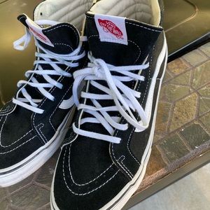 Vans high tops! Barley worn. Not my style but it could be yours.